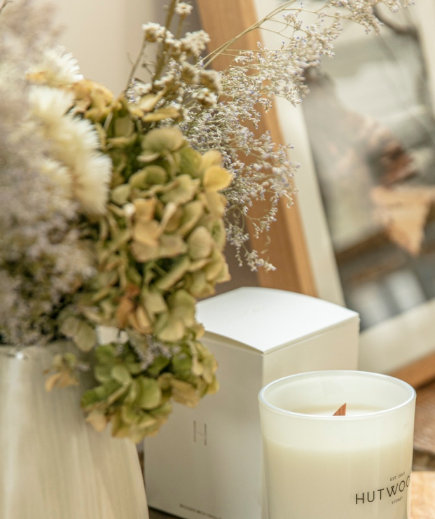A mix of candles and dried flowers